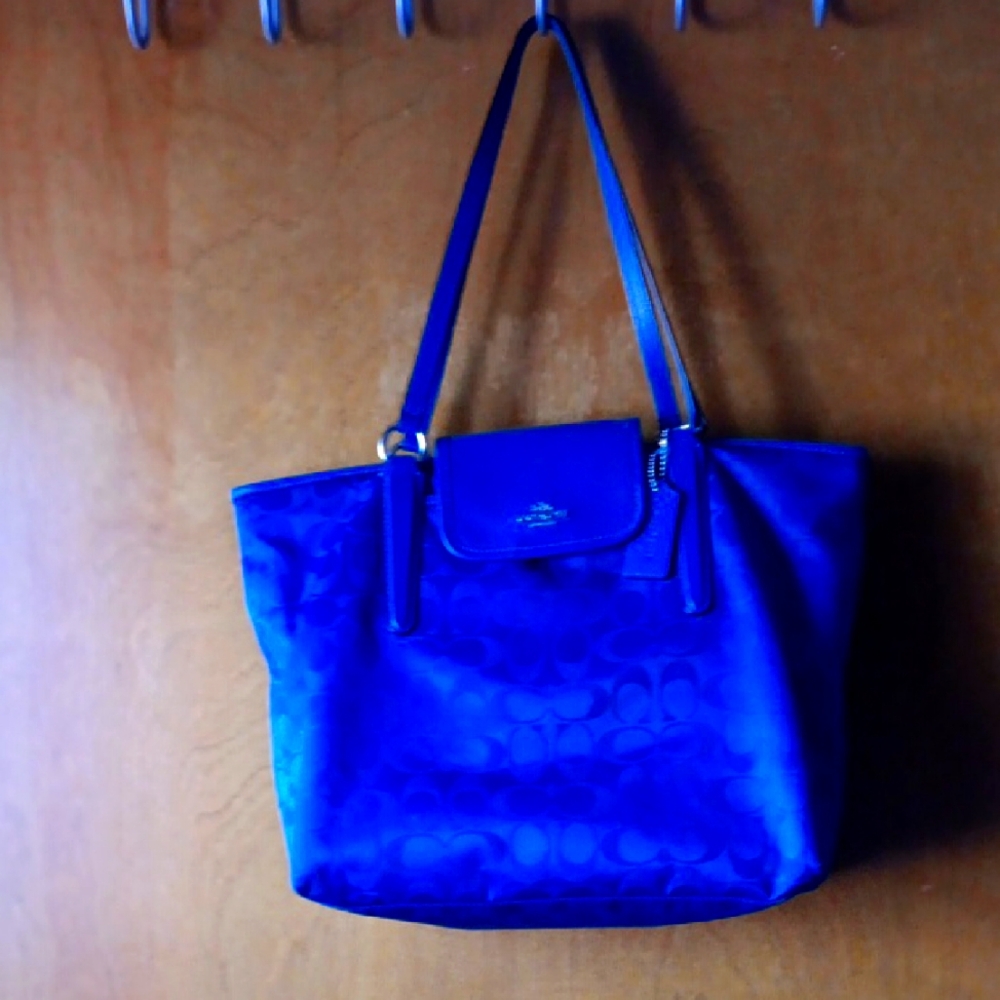 Blue COACH Tote Bag with Glossy Finish and Spacious Design